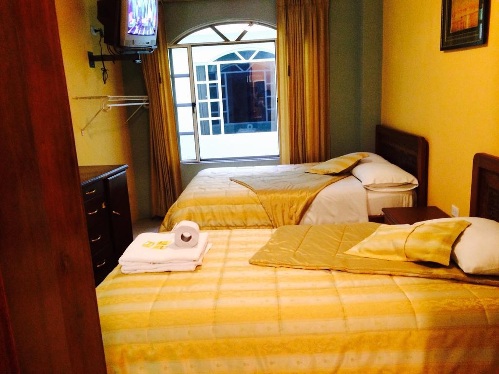 Hostal Grand Rio Баньйос Номер фото